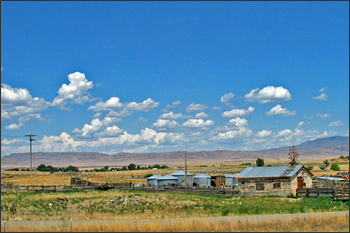 Agriculture is the largest industry in Idaho, but large areas of the state rely on irrigation to provide water for crops. Irrigated farms in southern Idaho use water from both the Snake River and the Snake River Plain aquifer. (Photograph ©2005 p.m.graham.)