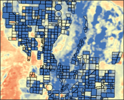 Map of northern Mason Valley, NV showing irrigated fields (polygons). Colors represent amounts of seasonal evapotranspiration derived from Landsat satellite thermal imagery (blue is high water use, and red is low water use).