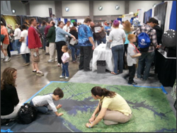 Visitors exploring the Landsat Chesapeake Bay mosaic at this year's festival