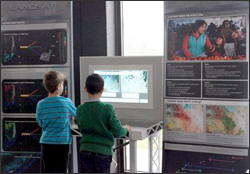 young visitors interacting with exhibit