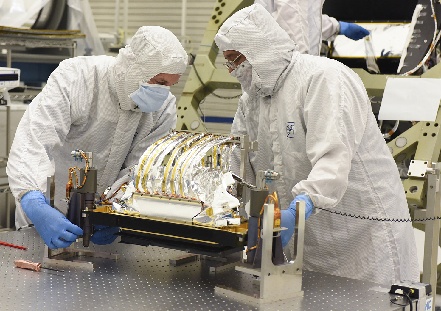 preparing to install OLI-2's focal plane assembly