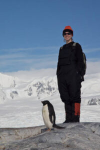 Scientist and penguin
