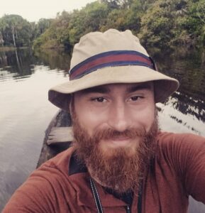 Dr. Eric Bullock on the Nanay River outside of Iquitos, Peru