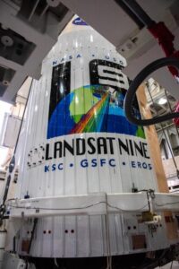 The Landsat 9 spacecraft, encapsulated in its fairing