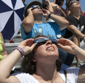 From the Kennedy Space Center Visitor Complex, guests joined Americans from coast to coast following the solar eclipse. Although a partial eclipse on Florida's Space Coast, young and old alike found many ways to watch the rare astronomical event. As the Moon passed between Earth and the midafternoon Sun, a shadow moved across the landscape. The 70-mile-wide totality path, or "umbral cone" -- where the entire Sun will vanish behind the Moon -- stretched across 14 states, from Oregon to South Carolina.
