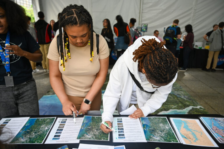 Two students participate in the Chesapeake Bay matching activity.