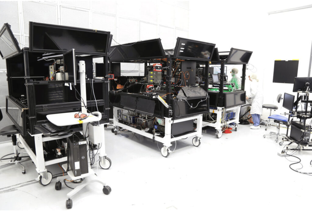 GLAMR laser tables, three black carts with laser instrumentation on top.