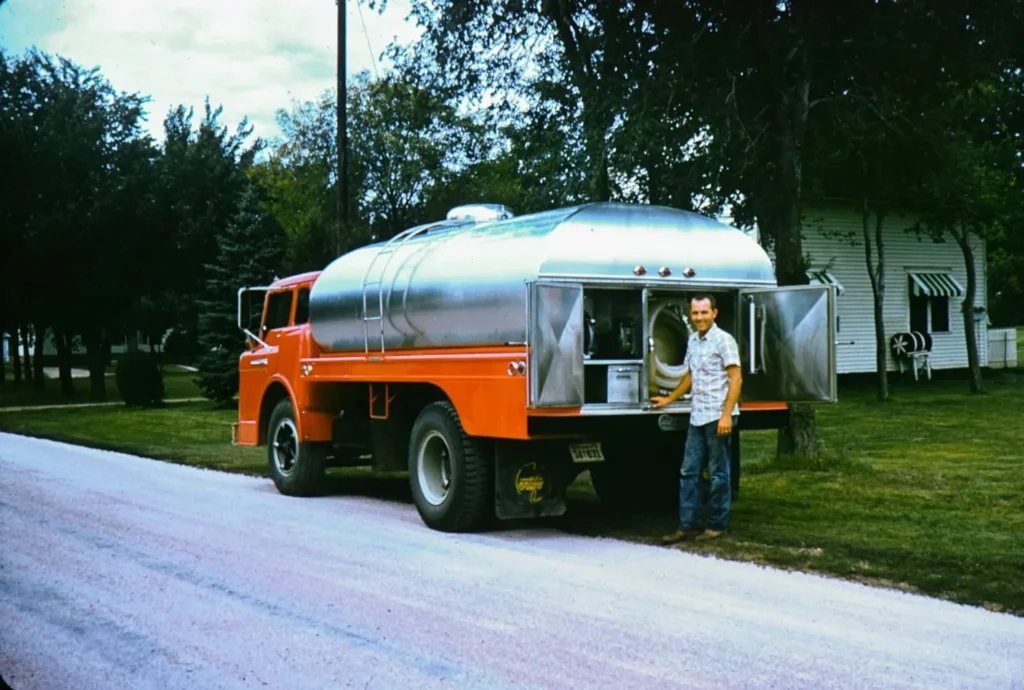 Dean Doorn, Brad Doorn’s father, stands beside a milk truck used in the family’s business of hauling milk across South Dakota in the 1960s and ’70s. Credit: B. Doorn