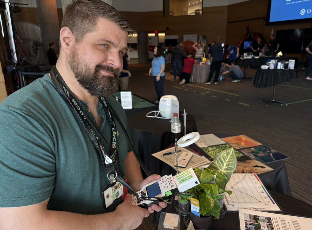 Landsat outreach specialist Michael leading a demonstration with STELLA